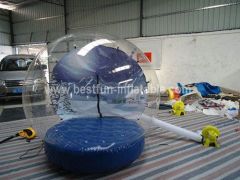 Inflatable snow globe for events