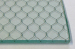 glass with the JOYA decorative wire mesh roles as new building materials