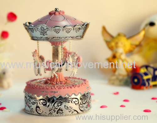 PINK POLYRESIN MUSICAL CAROUSEL