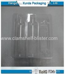 Plastic blister packing tray for wine