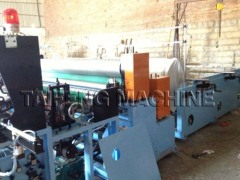 Automatic rewinding and perforating paper machine