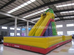 Inflatable slide climbing rock wall