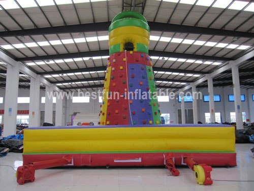 Inflatable slide climbing rock wall