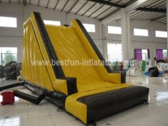 Inflatable tower climbing wall with slide