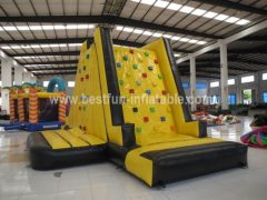 Inflatable tower climbing wall with slide