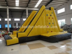 Inflatable tower climbing wall with slide