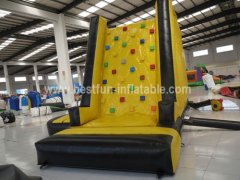Inflatable tower climbing wall with slide