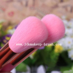 Pink short handle makeup brush