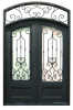 ornamental elegance wrought iron double door with eyebrow arch