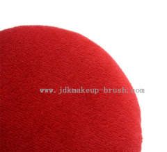 Red round makeup powder puff