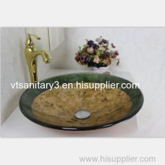 glass basin with waterfall tap