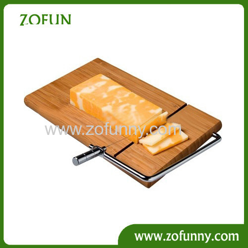 Cheese slicer with bamboo cutting board