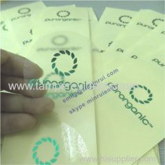 Round transparent stickers stamped with glossy foil for cosmetics use