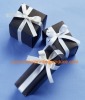 black jewelry boxes with white ribbon