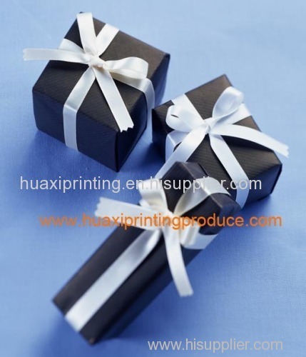 black jewelry boxes with white ribbon