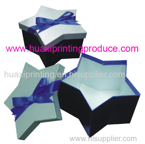 star shaped gift boxes with deep blue varabow