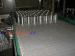 Raised rib belt conveyor E41 enables us to make product transfers by using finger plates.