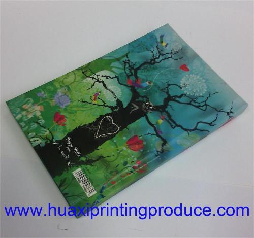 green caver with a big cartoon tree notebooks