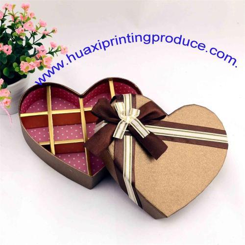 light brown heart shaped chocolate boxes with grid and ribbon