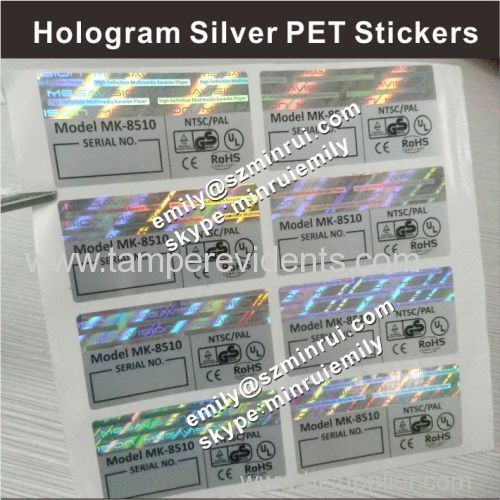 Stamped hologram labels on pet vinyl labels