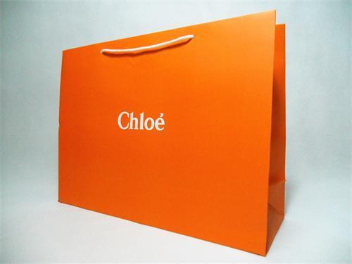 orange square handle bags