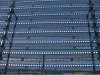 Windbreak and dust wall - perforated corrugated panel barrier