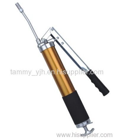 orange color grease gun with release valve