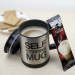 Stainless steel self stirring mug