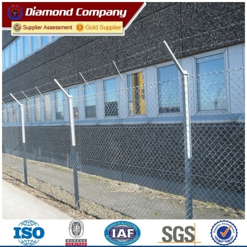 Chain link fence top barbed wire