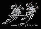A beautiful rhinestone butterfly with two crystal tail bridal hair combs vintage for women