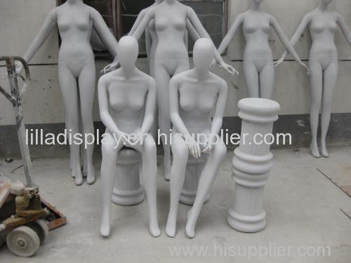 sitting mannequins with egg head