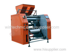 Automatic cling film rewinding machine