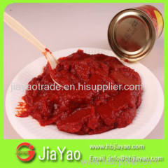 canned tomato paste in drum