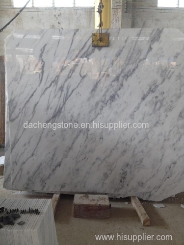 Carrara white marble tiles or slabs