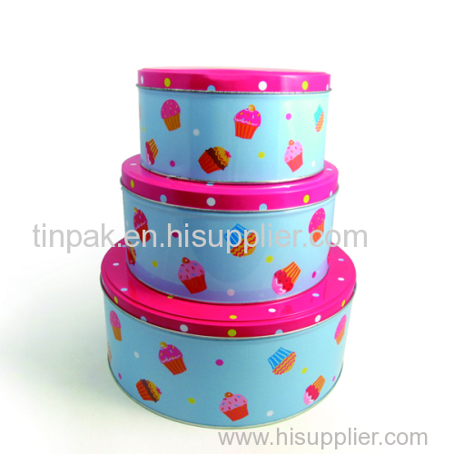 large round Christmas tin box with 3 sets