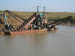 bucket chain type dredger together with a barge