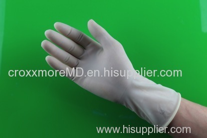 Single-use sterile rubber surgical gloves lightly powdered