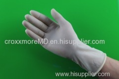 Single-use sterile rubber surgical gloves lightly powdered