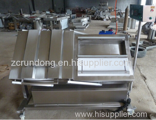 Tilt adjustable vacuum packaging machine