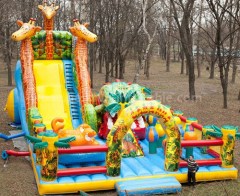 Inflatable jail bounce house with slide