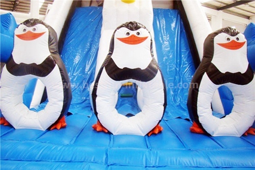 Inflatable madagascar penguin slide
