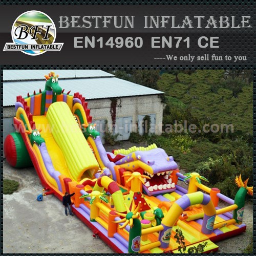 Inflatable obstacle course slide
