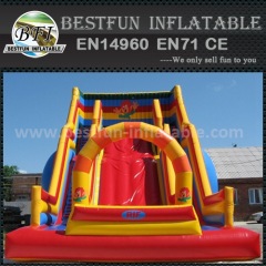 Inflatable slide with arch