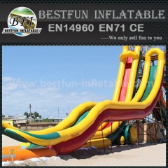 Inflatable slide with long slip