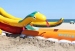 Inflatable slide with long slip