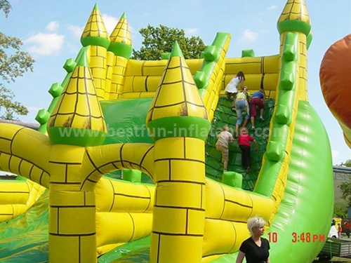 Large inflatable green slide