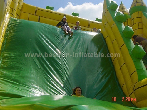 Large inflatable green slide