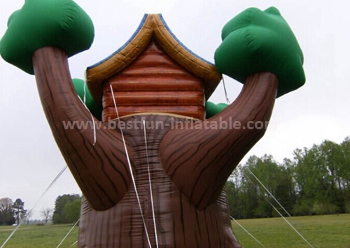 Tree house inflatable slide