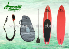 11' black white fish Epoxy paddle boards work with the board to make the most out of a wave