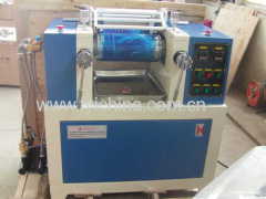 Laboratory testing two roll mill mixing compound